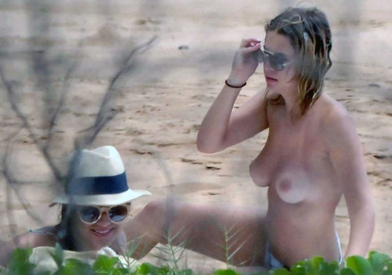 Ashley Benson nude tits on a beach